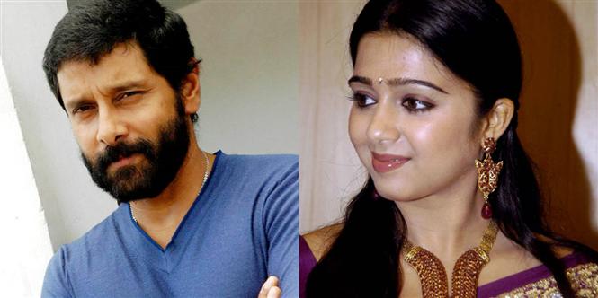 Charmee to make a special appearance in Vikram's 10 Enradhukulla
