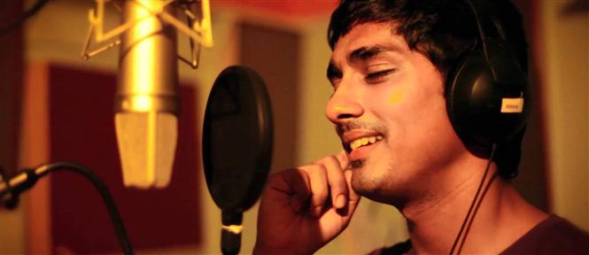 Siddharth excited about singing his 15th song for Enakkul Oruvan