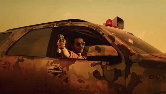 Thug Life: Silambarasan TR exudes 'New Thug' swag manoeuvring a Border Patrol Toyota Fortuner