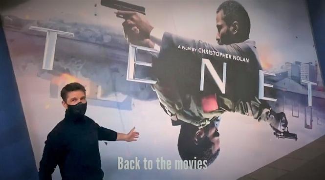 Tom Cruise watches Christopher Nolan's TENET in a movie theater!